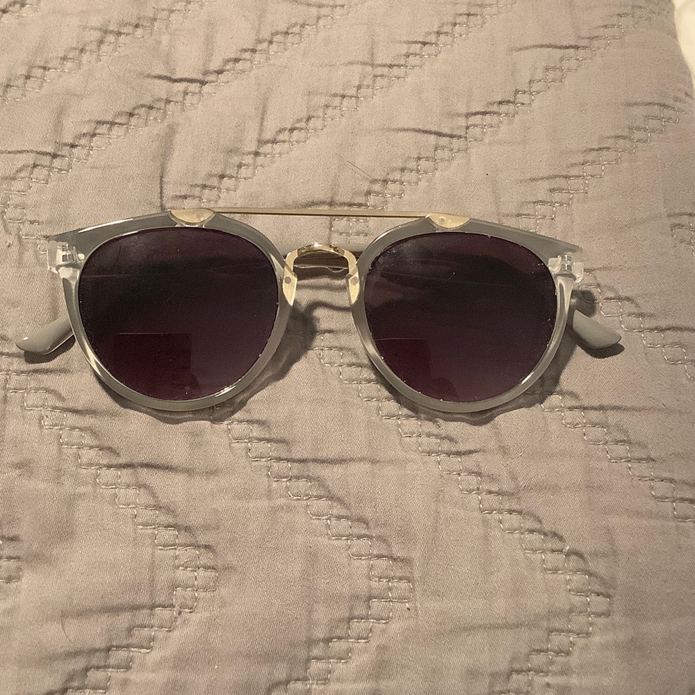 Amazon Clear Frame Sunglasses with Gold Bridge and Dark Purple Lenses